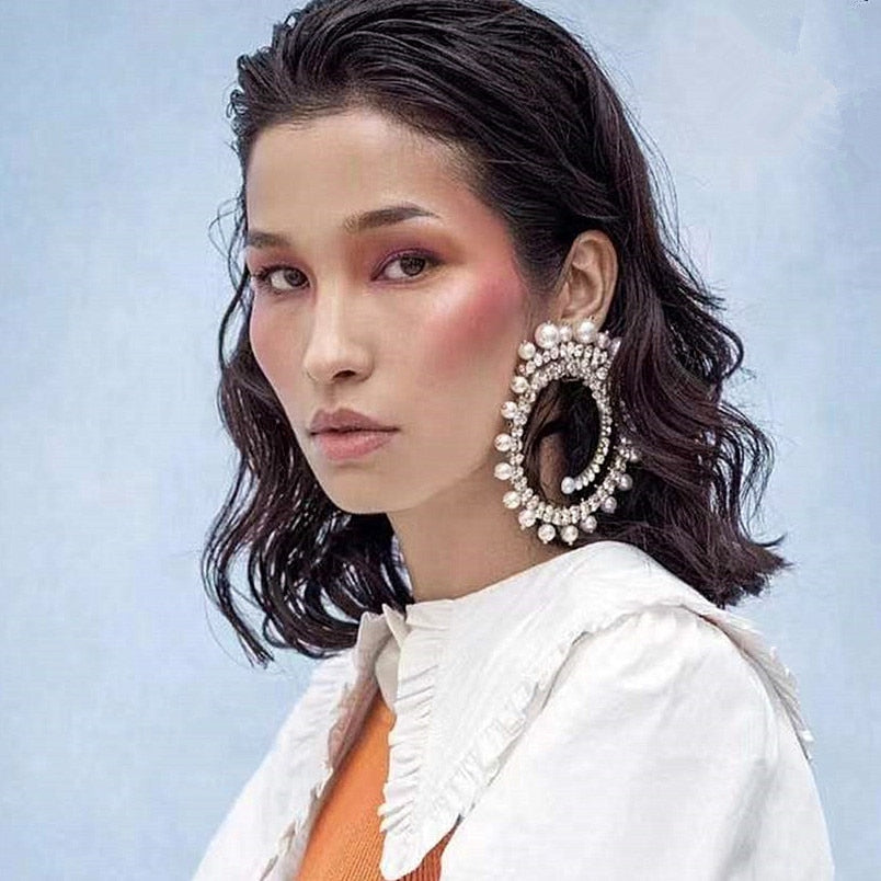 Orecchini a buco Queen Moora (2 colori)