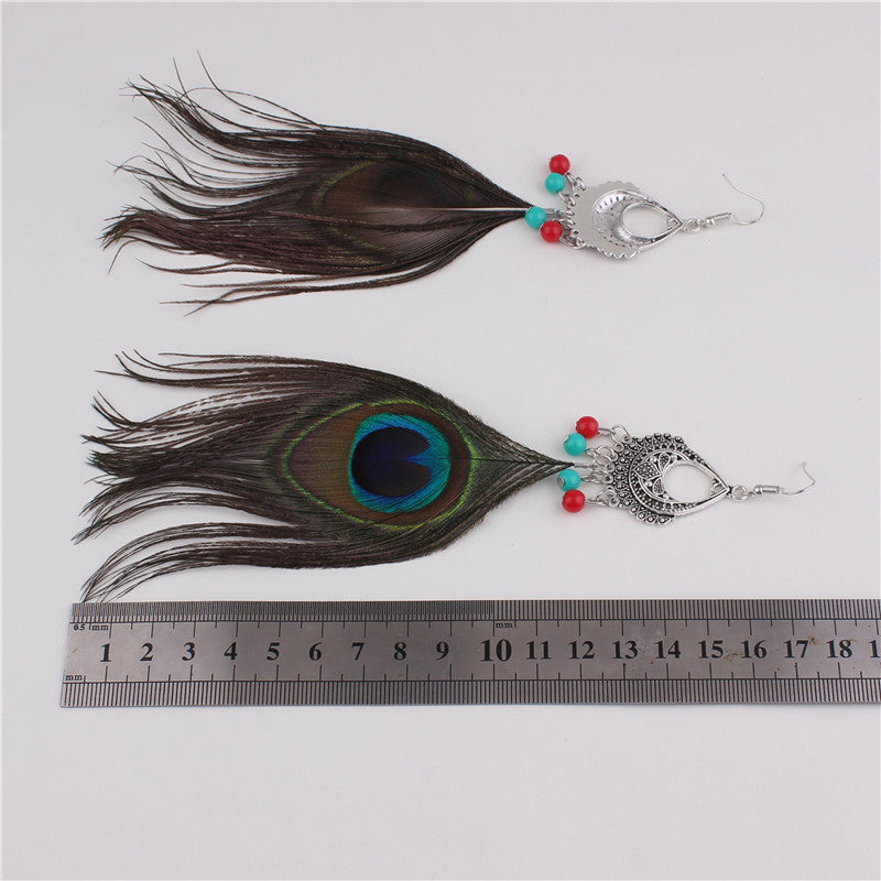 Orecchini a buco Drag Peacock