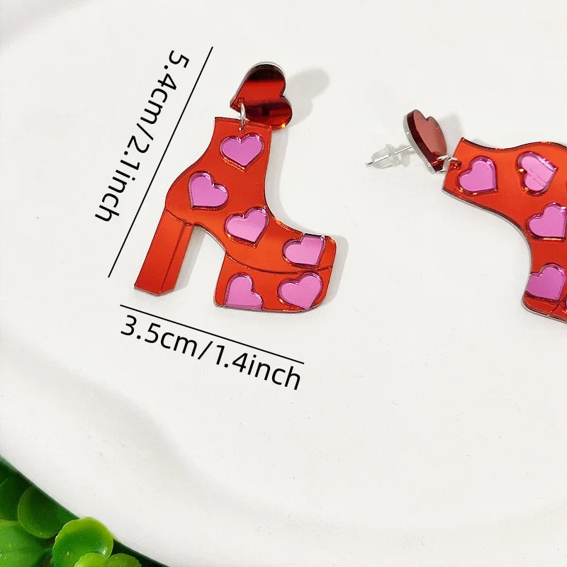 Orecchini a buco Queen Boots