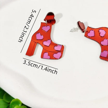 Orecchini a buco Queen Boots