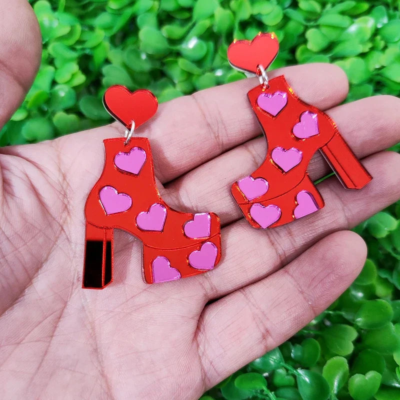 Orecchini a buco Queen Boots