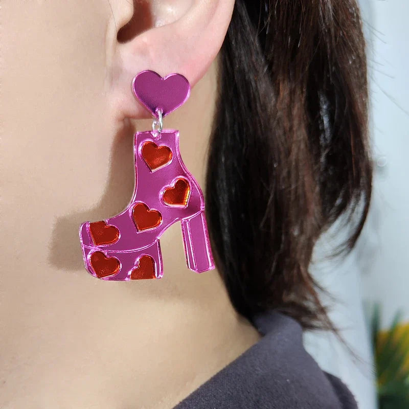 Orecchini a buco Queen Boots