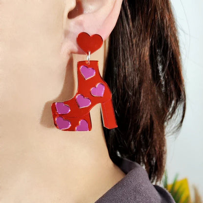 Orecchini a buco Queen Boots