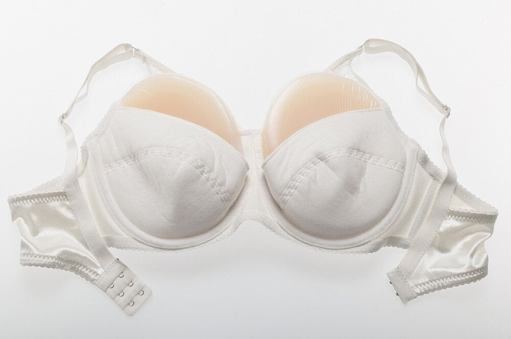 Tette 1000g con reggiseno (4 colori)