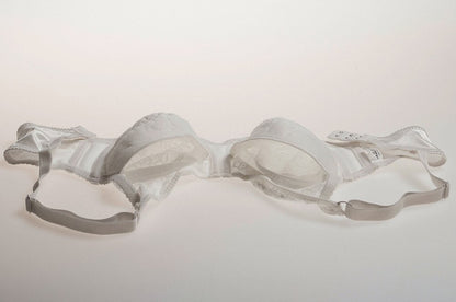 Tette 1000g con reggiseno (4 colori)