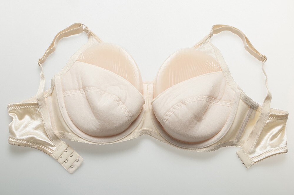 Tette 1000g con reggiseno (4 colori)