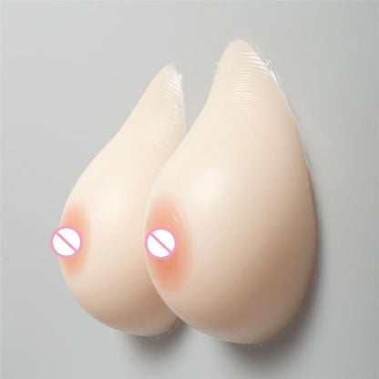 Tette 1000g con reggiseno (5 colori)