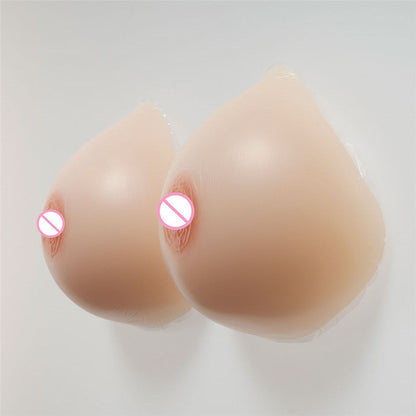 Tette 1000g con reggiseno (3 colori)